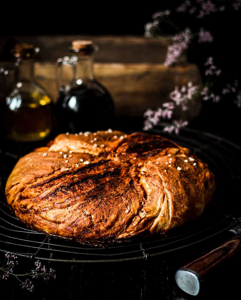 picture of vegan pizza twist bread on table