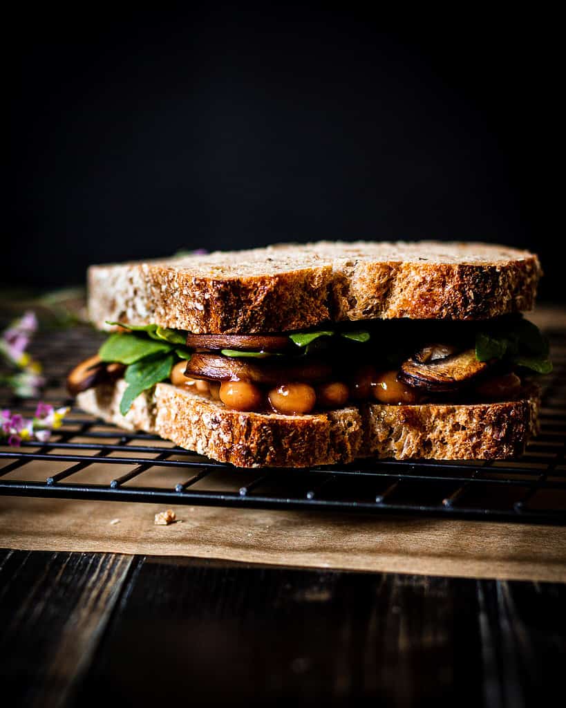 Sandwich with baked beans and mushrooms