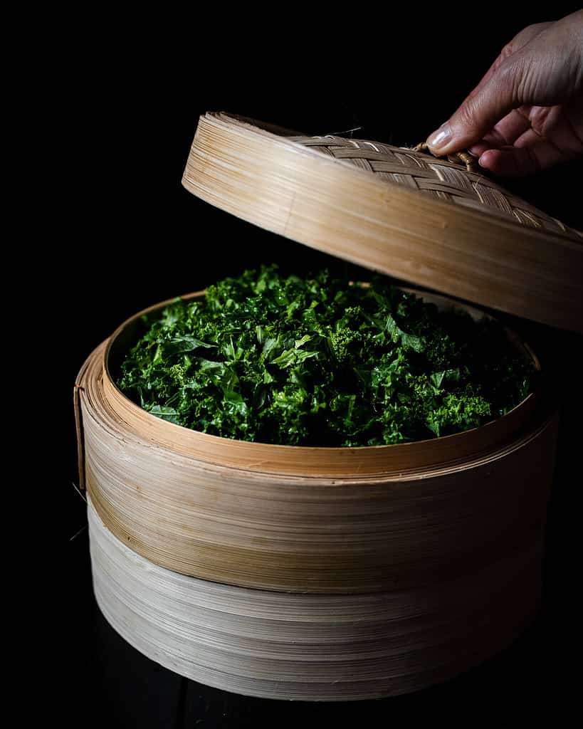kale in bamboo steamer