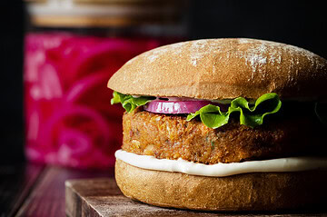 pink pickles onions with burger