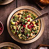 kale salad with roasted sesame dressing and pomegranate