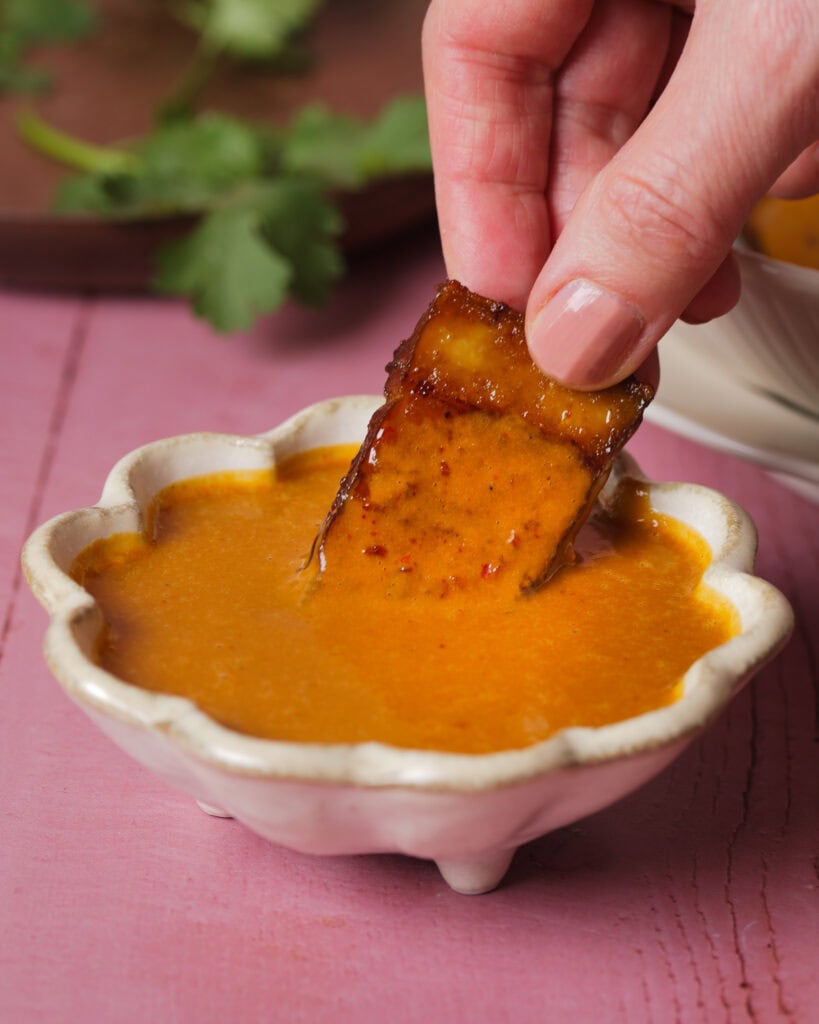 Grilled and marinated smoked tofu with peanut sauce
